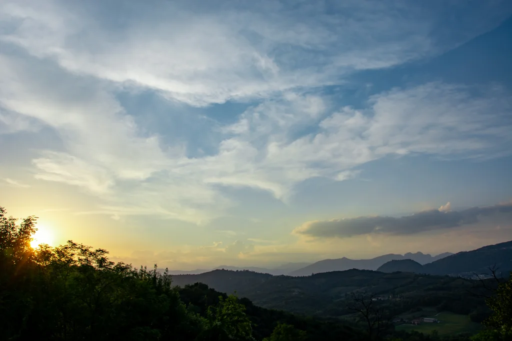 Sunset light over the hills of the Curone Valley